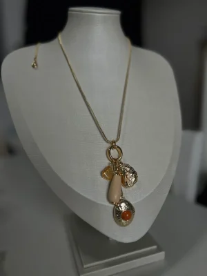 COLAR DOURADO PG MET RESINA