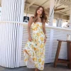 “vestido amber kaele longo floral amarelo, caimento leve” “vestido longo floral com movimento à beira-mar” “detalhe de estampa floral e saia fluida”