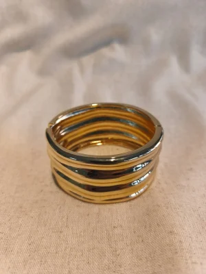 BRACELETE DOURADO LARGO