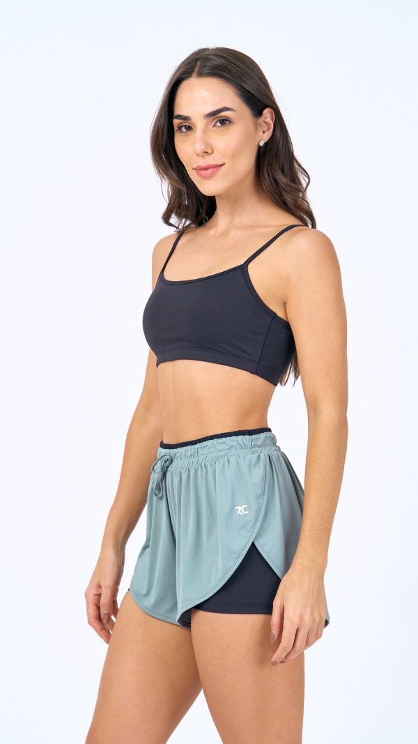 SHORTS SOBREPOSTO COM RECORTE